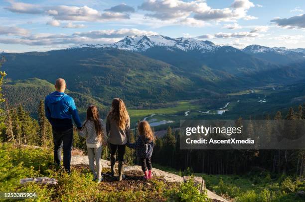 family connecting in natures beauty - grand 8 stock pictures, royalty-free photos & images