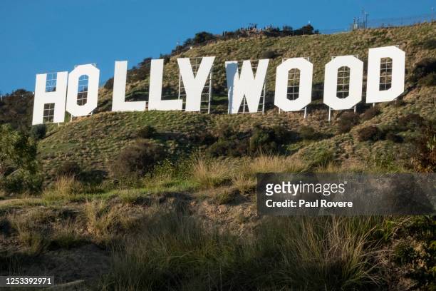 Tourists hike to the Hollywood sign on December 15 in Los Angeles, California. Originally created in 1923 as a temporary advertisement for a local...