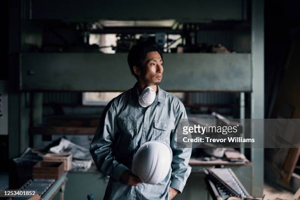 portrait of a blue collar factory worker in japan - 工場　日本人 ストックフォトと画像