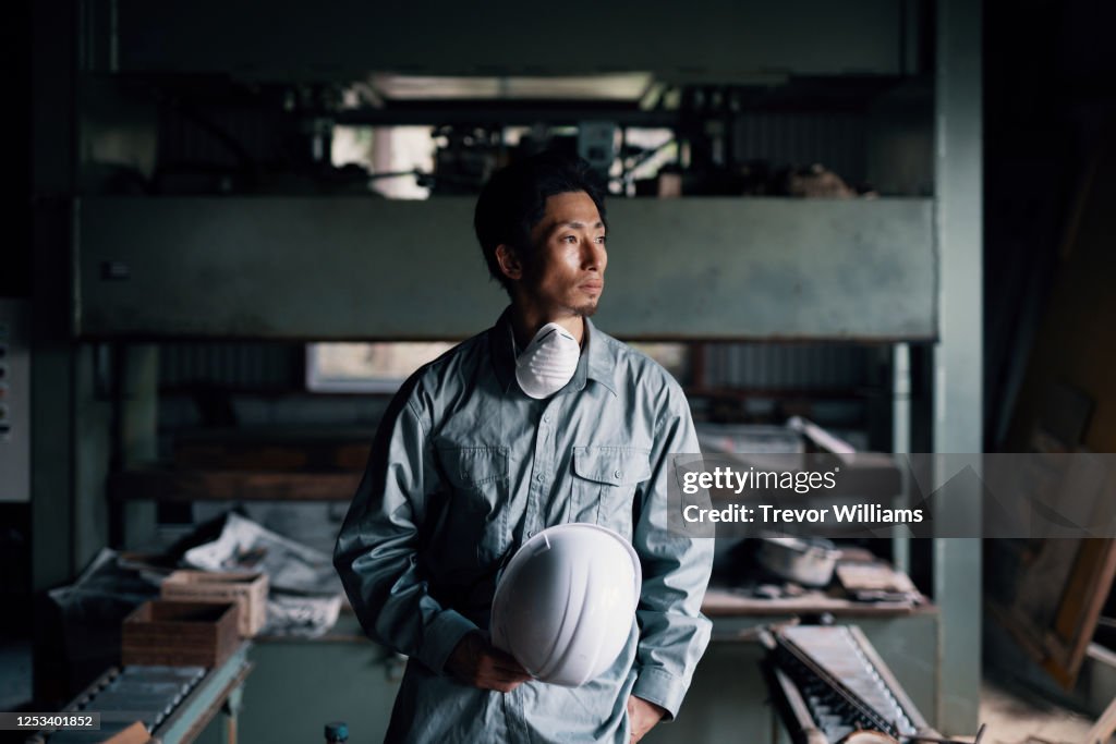 Portrait of a blue collar factory worker in Japan