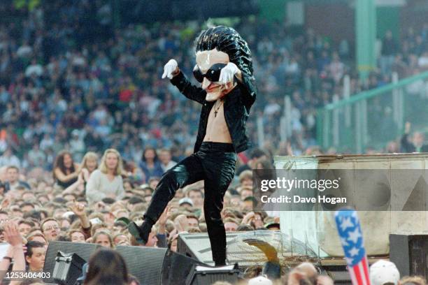 Giant puppets in the crowd during the Zoo TV tour at Earls Court on May 31st 1992