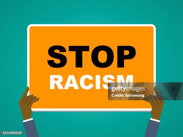 Stop Racism Examples Stop Racism Conceptstop Racism Sign In Businessmans Hands High-Res ...