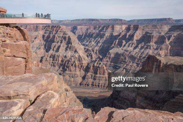 General view of tourists enjoying the view from the "Skywalk" at Eagle Point along the West Rim of the Grand Canyon in the Hualapai Indian...