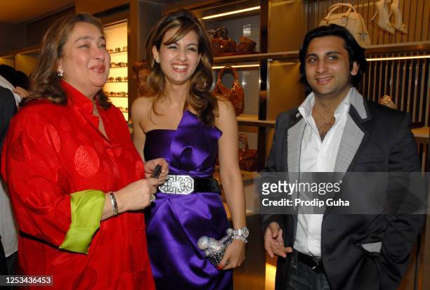 Reema Kapoor, Natasha Poonawalla and Adar Poonawalla attend the Gucci store opening on October 13, 2007 in Mumbai, India.