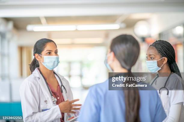 healthcare professionals in mask - pollution mask stock pictures, royalty-free photos & images