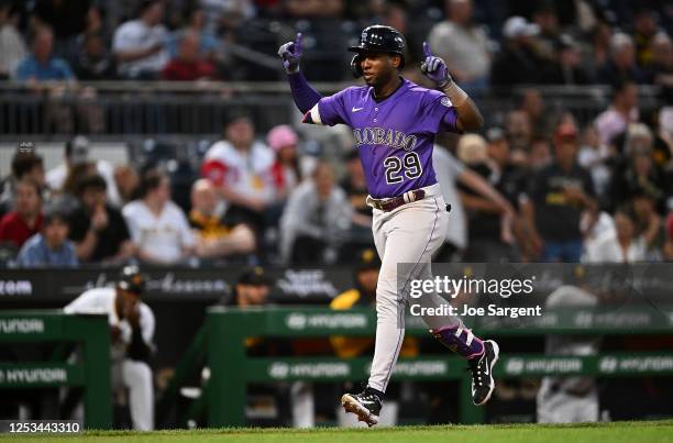 Jurickson Profar of the Colorado Rockies celebrates his two run home run during the seventh inning against the Pittsburgh Pirates at PNC Park on May...