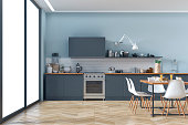 Modern kitchen and dining room stock photo