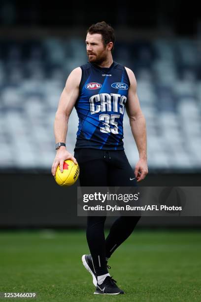 Patrick Dangerfield of the Cats looks on during the Geelong Cats training session at GMHBA Stadium on May 10, 2023 in Geelong, Australia.