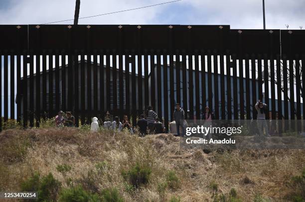 Migrants of various nationalities have been trapped between the primary and secondary border fences of the San Diego-Tijuana border sector for seven...