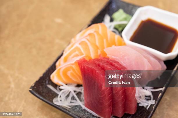 traditional japanese cuisine, raw fish sashimi - redfish stockfoto's en -beelden