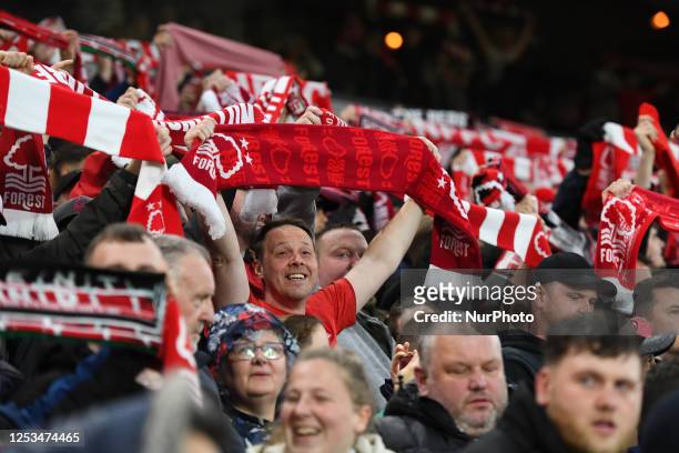 Forest supporters holing up scarves during the Premier League match between Nottingham Forest and Southampton at the City Ground, Nottingham on...