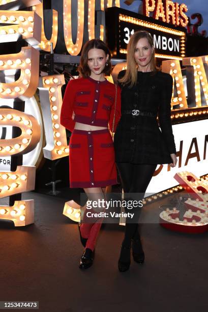 Iris Apatow and Leslie Mann at the Chanel Cruise 2024 Collection fashion show held at Paramount Studios on May 9, 2023 in Los Angeles, California.