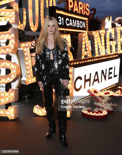 Elle Fanning at the Chanel Cruise 2024 Collection fashion show held at Paramount Studios on May 9, 2023 in Los Angeles, California.