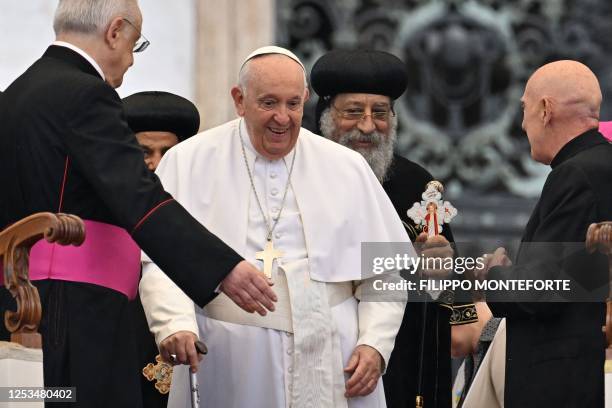 Pope Francis and Leader of the Coptic Orthodox Church of Alexandria, Pope Tawadros II arrive for the weekly general audience on May 10, 2023 at St....