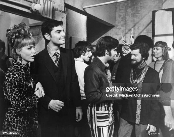 Carrie Snodgress and Richard Benjamin arrive at a party attended by people with whom he's anxious to identify in a scene from the film 'Diary Of A...