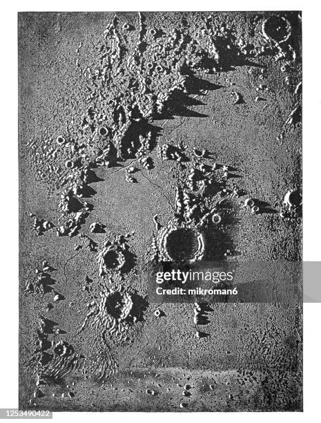 old engraved illustration of astronomy, moon's moon's mountains and craters - volcanic crater stockfoto's en -beelden