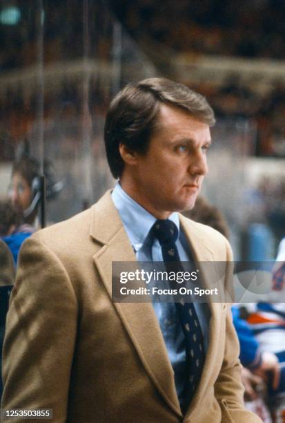 Head coach Herb Brooks of the New York Rangers looks on from the bench during an NHL Hockey game circa 1981 at Madison Square Garden in the Manhattan...