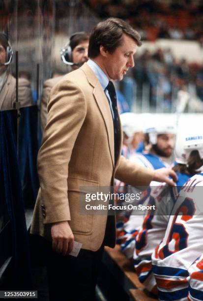Head coach Herb Brooks of the New York Rangers looks on from the bench during an NHL Hockey game circa 1981 at Madison Square Garden in the Manhattan...