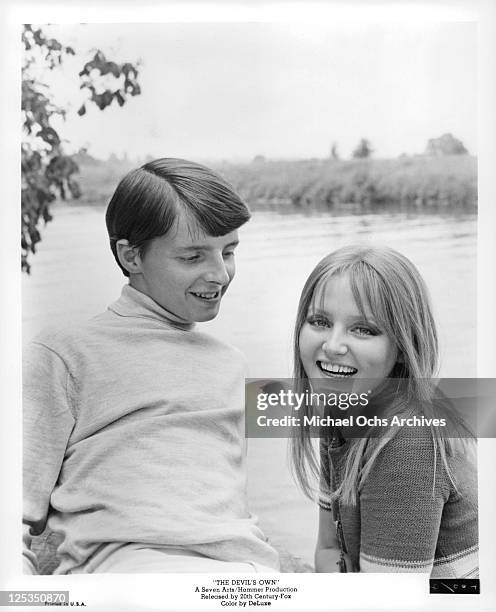 Martin Stephens sharing a happy moment with Ingrid Brett in a scene from the film 'The Devil's Own', 1966.