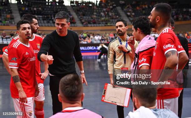 Benfica head coach Mario Silva talks to his players during the UEFA Futsal Champions League Finals 2022/23 Third-place Play-off match between SL...