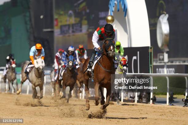 Oscar Chavez winning Dubai Kahayla Classic track during the Dubai World Cup at Meydan Racecourse on March 25, 2023 in Dubai, United Arab Emirates.