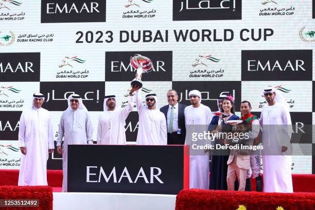 Sheikh Mansoor bin Zaed Al Nahyan, Majed Al Jahoori and Oscar Chavez after wining Dubai Kahayla Classic track during the Dubai World Cup at Meydan...