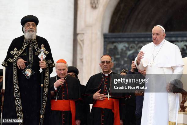 Leader of the Coptic Orthodox Church of Alexandria, Pope Tawadros II , blesses attendees as Pope Francis looks on during the weekly general audience...