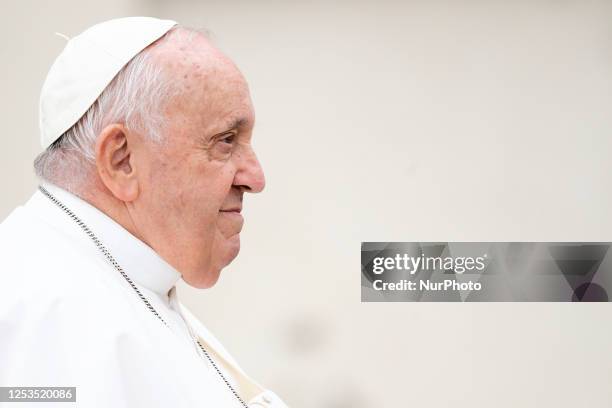 Pope Francis arrives in St. Peter's Square to lead his weekly general audience at The Vatican, Wednesday, May 10, 2023.