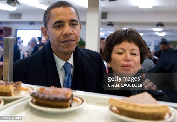 President-elect Barack Obama, alongside senior advisor Valerie Jarrett, looks at slices of pie while ordering lunch at Manny's Coffee Shop and Deli...