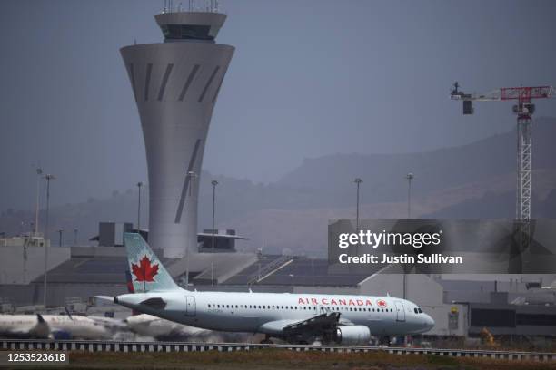 An Air Canada Airbus A320 prepares to take off from San Francisco International Airport to Toronto on June 30, 2020 in San Francisco, California....