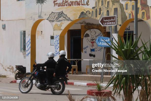 Security services patrol near the scene of an attack which took place yesterday during a pilgrimage at the Ghriba synagogue, Africa's oldest...