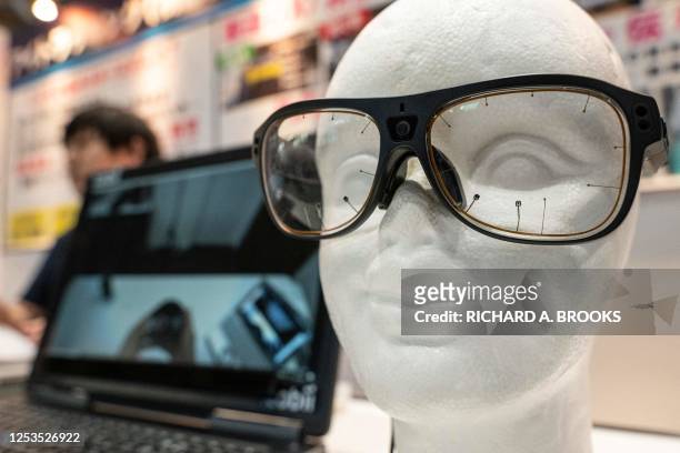 Glasses by Swedish cutting-edge "eye tracking" technology company Tobii are pictured during the three-day 7th AI Expo, part of NexTech Week Tokyo...