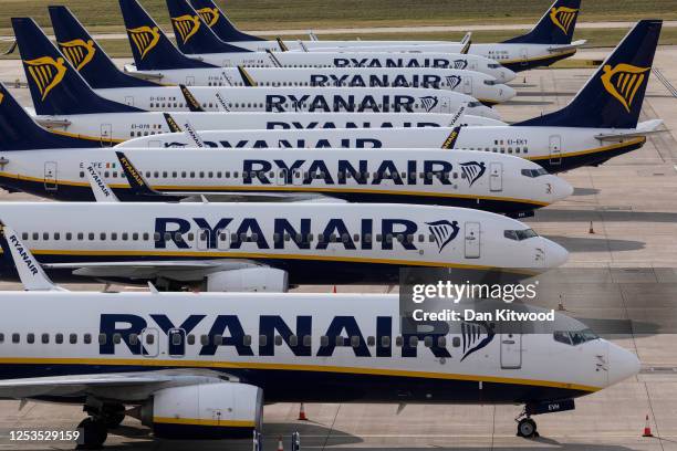 Ryanair planes are parked in a stand at Stansted Airport on June 30, 2020 in Stansted, United Kingdom. Passengers travelling between the UK and some...