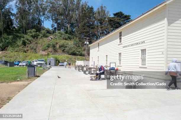 Warming Hut is visible near Crissy Field, in the Presidio, San Francisco, California, with picnic area and tourists visible, June 28, 2020.