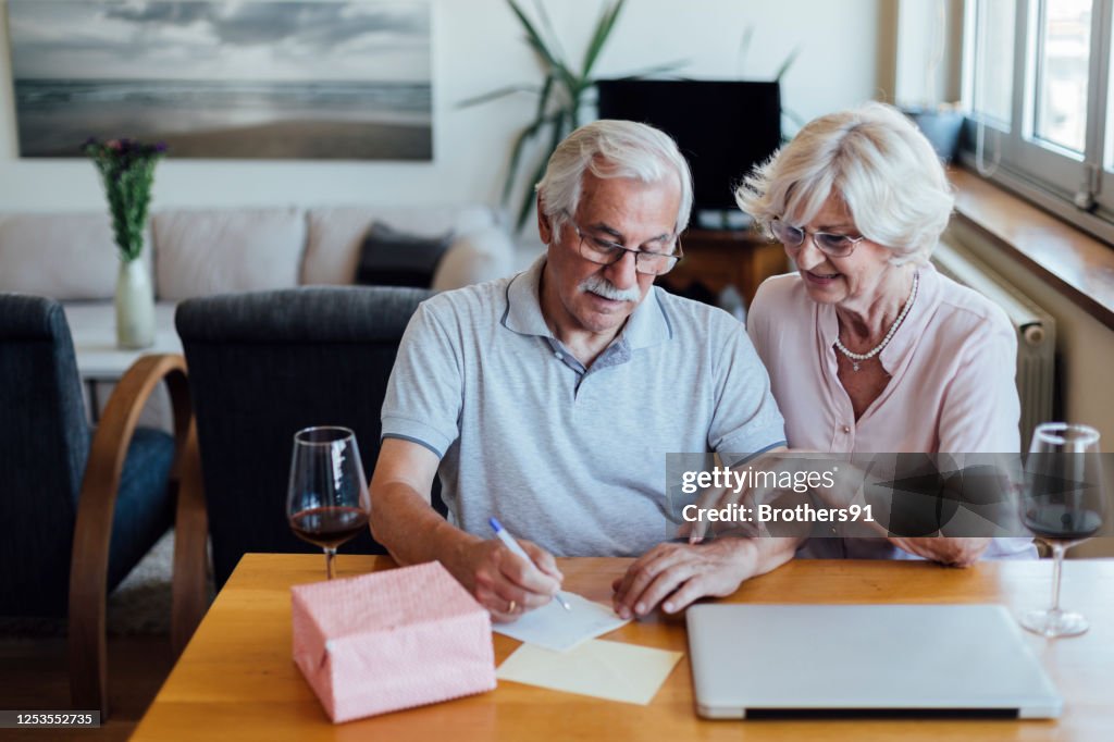 A Man Riting A Letter Senior Man Writing A Letter High-Res Stock Photo - Getty Images