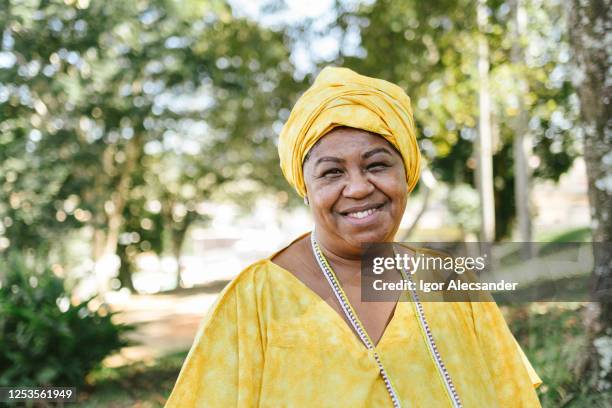 portrait of a brazilian woman candomblé - brazilian headdress stock pictures, royalty-free photos & images