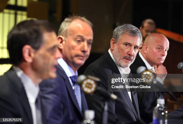 From left, Boston Bruins GM Don Sweeney, CEO Charlie Jacobs, President Cam Neely and head coach Jim Montgomery, at an end-of-season press conference.