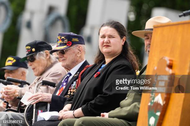 Ukrainian Ambassador to the U.S. Oksana Markarova sits with Army veteran Harry F. Miller, who served in the Battle of the Bulge with the 740th Tank...