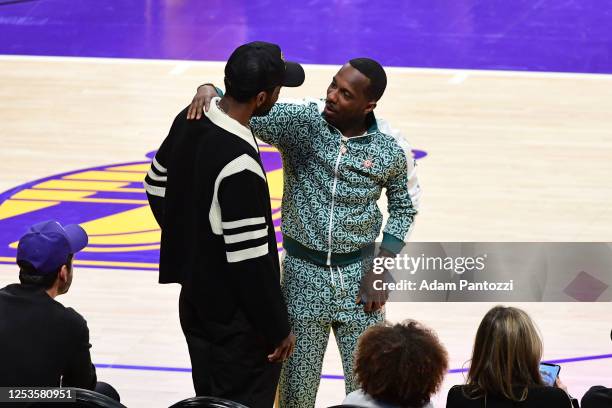 Rich Paul & Kyrie Irving of the Dallas Mavericks embrace during the game during round One Game Six of the 2023 NBA Playoffs on April 28, 2023 at...