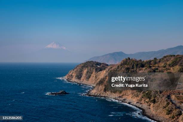 mt. fuji over the suruga bay from izu peninsula - suruga bay stock pictures, royalty-free photos & images