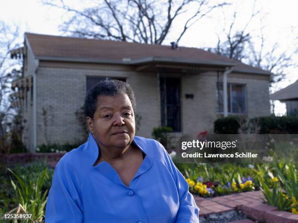 Portrait of Elizabeth Eckford as she sits outside her home, Little Rock, Arkansas, March 6, 2011. Eckford was one of the Little Rock Nine who, after...