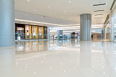 modern shopping mall interior with shopfront and corridor.