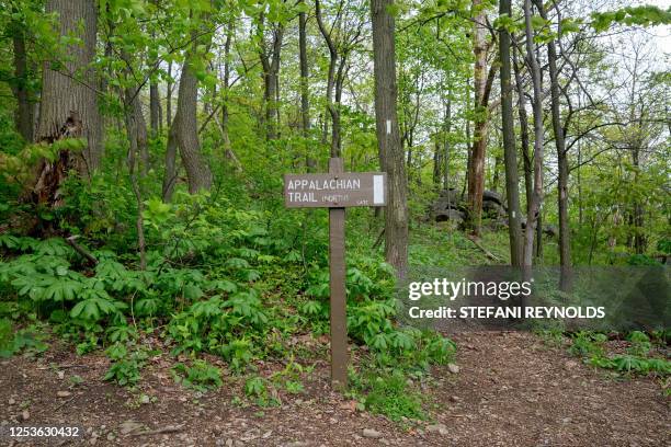 Sign for the Appalachian Trail in Halifax, Pennsylvania, on May 3, 2023. Each year, approximately 3,000 people set out to attempt a thru-hike of the...