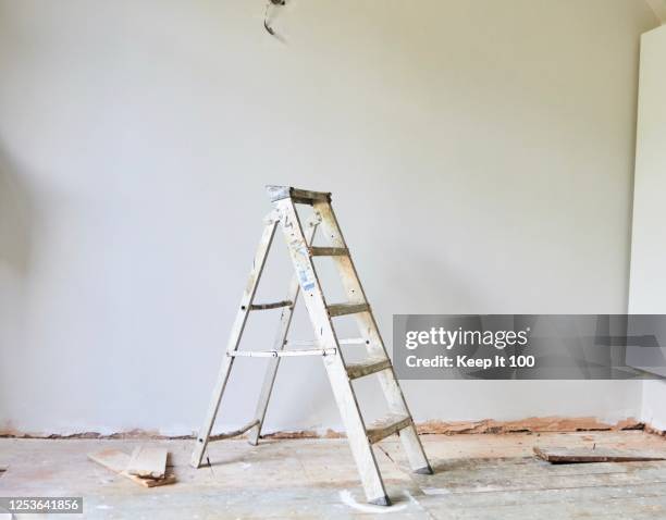 still life of a step ladder - wall renovation stock pictures, royalty-free photos & images