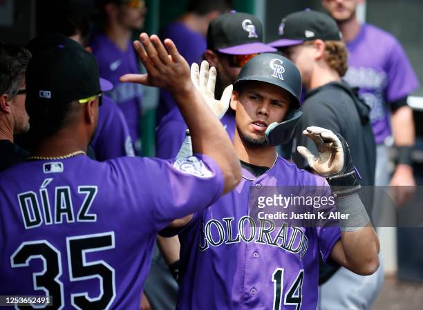 Ezequiel Tovar of the Colorado Rockies celebrates after scoring on an RBI double in the fourth inning against the Pittsburgh Pirates at PNC Park on...