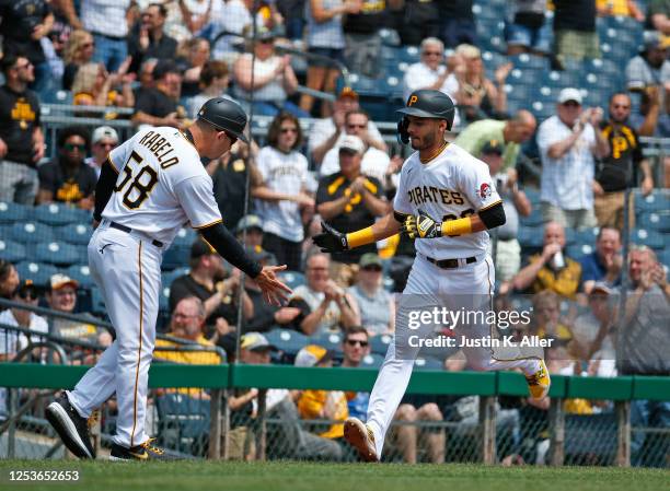 Tucupita Marcano of the Pittsburgh Pirates rounds third after hitting a solo home run in the second inning against the Colorado Rockies at PNC Park...