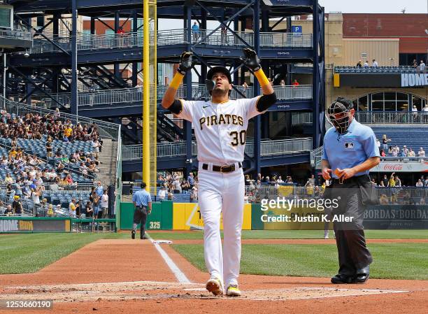 Tucupita Marcano of the Pittsburgh Pirates reacts after hitting a solo home run in the second inning against the Colorado Rockies at PNC Park on May...
