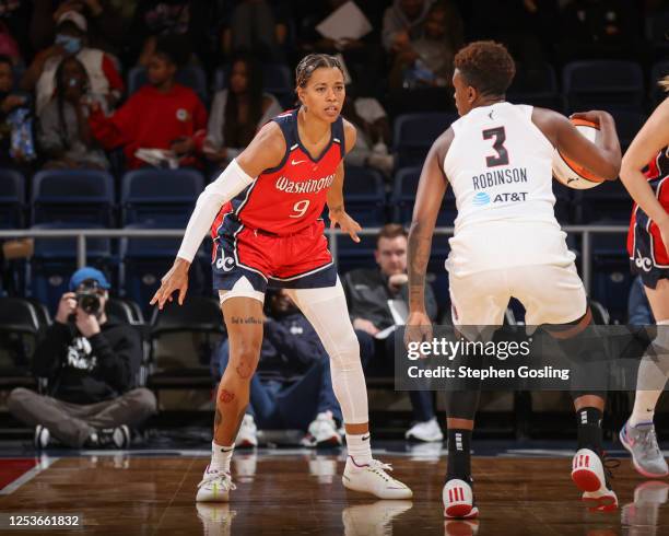 Natasha Cloud of the Washington Mystics plays defense during the game against Danielle Robinson of the Atlanta Dream during the preseason game on May...