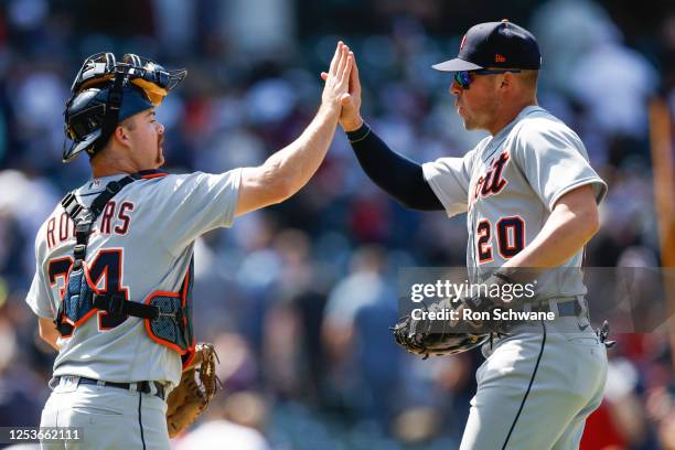 Jake Rogers and Spencer Torkelson of the Detroit Tigers celebrate a 5-0 win against the Cleveland Guardians at Progressive Field on May 10, 2023 in...