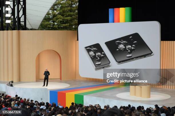 May 2023, USA, Mountain View: Google's device boss Rick Osterloh presents the foldable smartphone Pixel Gold at the developer conference Google I/O....